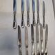 12 silver-plated knives
