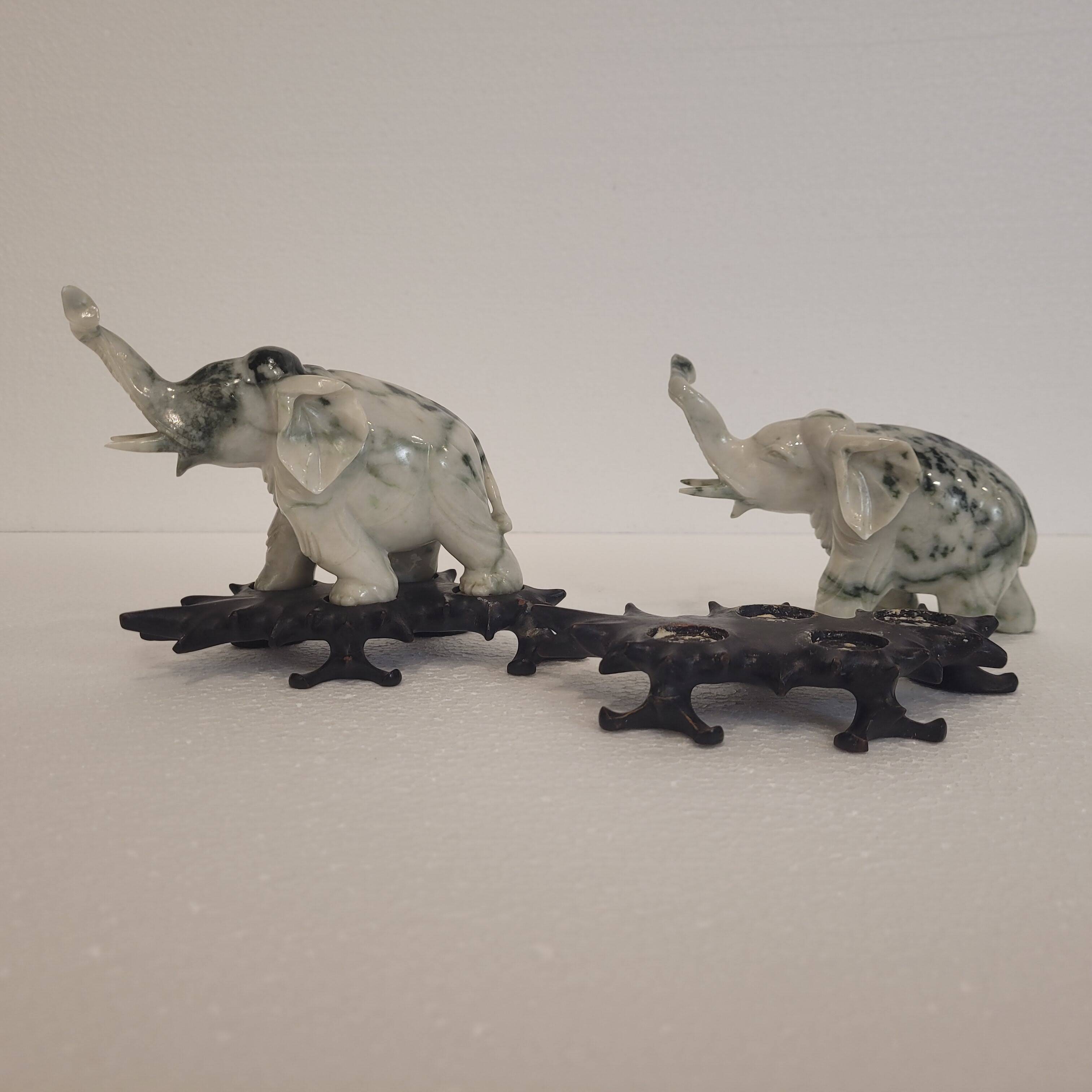 Pair of elephant paperweights, veined marble, 80s - France