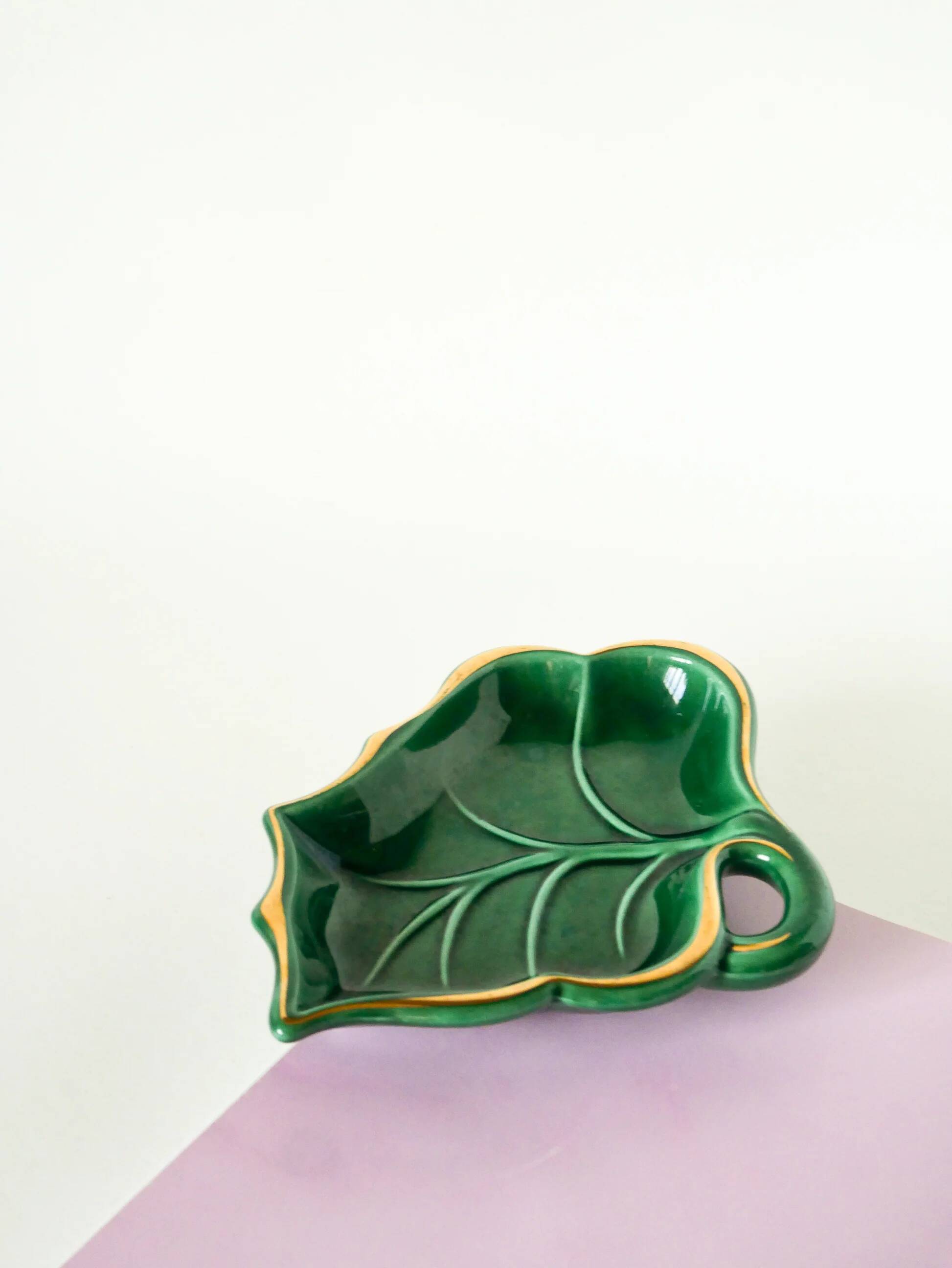 Leaf-shaped earthenware catchall, green and gold, 1970.