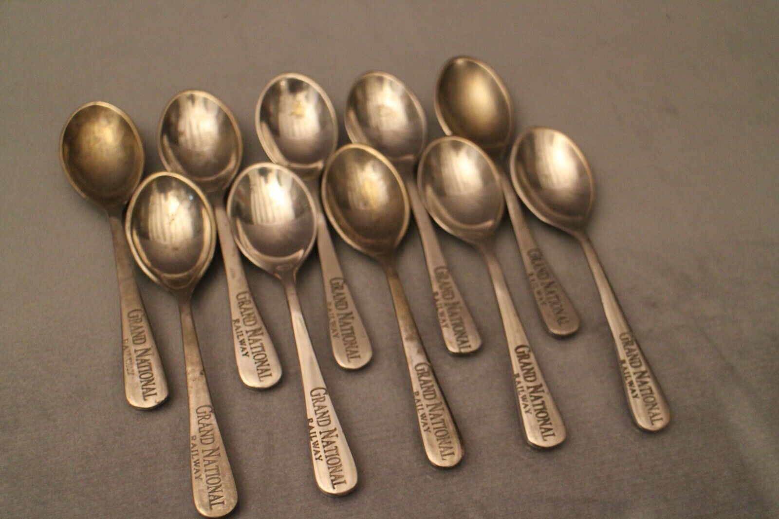 Set of 10 small spoons marked Grand National Railway