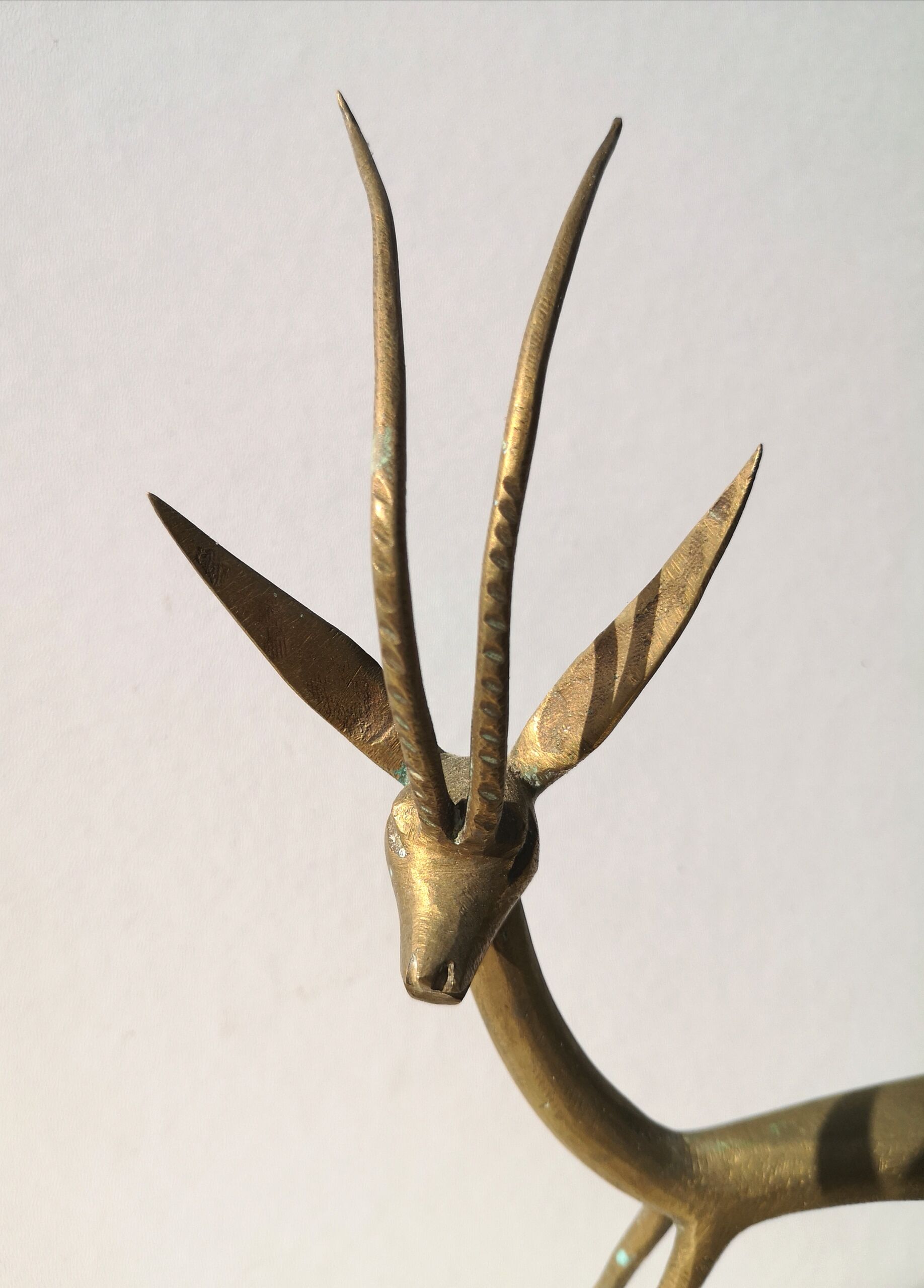 Trio of gazelles / solid brass antelopes