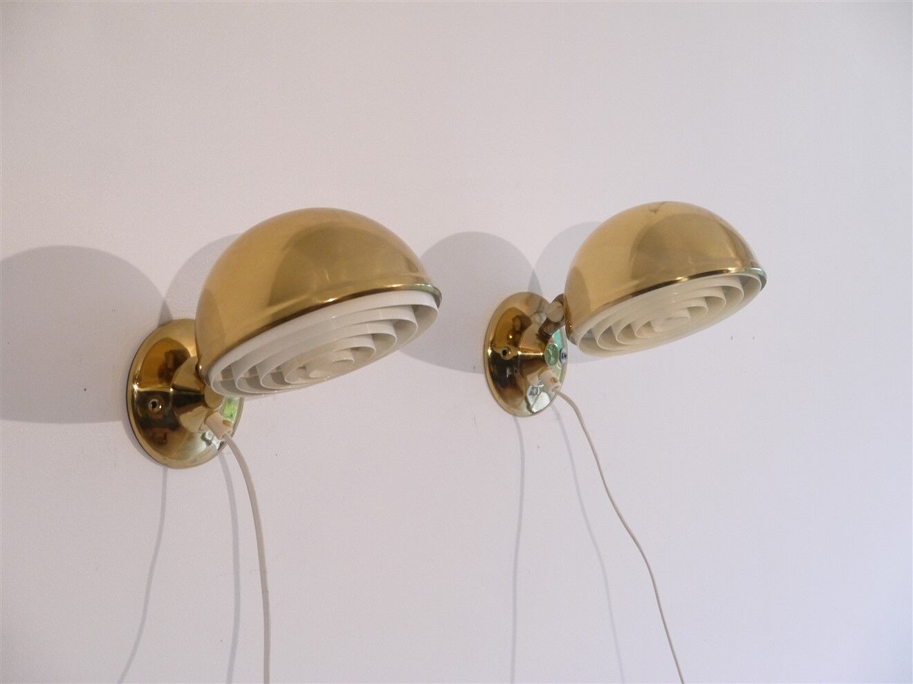 Pair of Danish brass wall lamps by Knud Christensen 1970