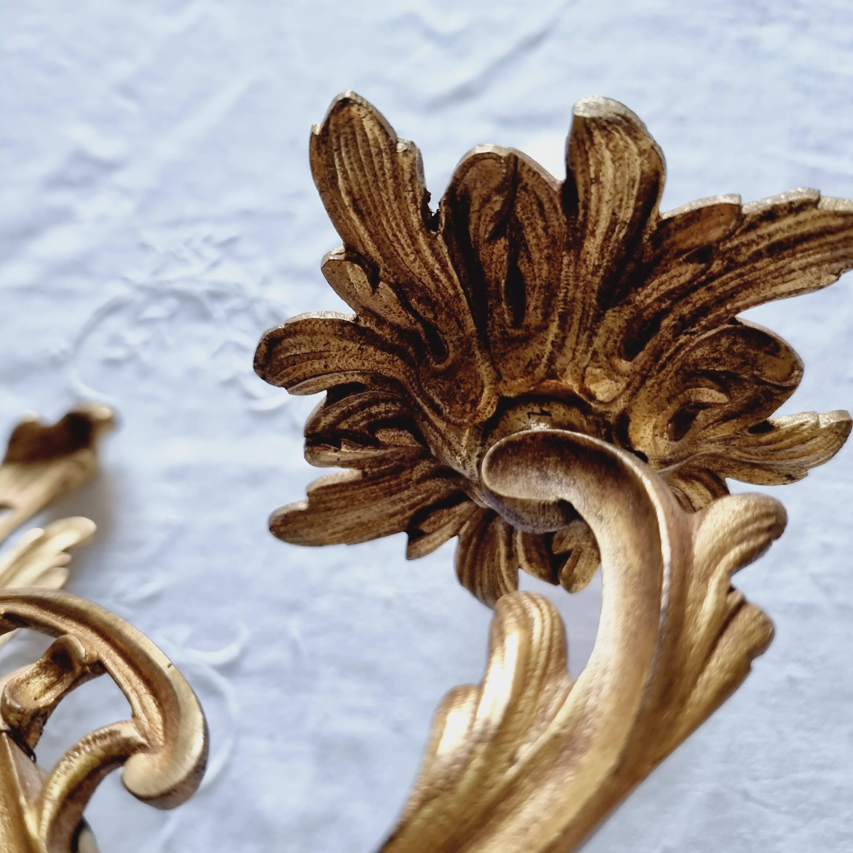 Pair of vintage French wall sconces in bronze, Louis XV Rococo style.