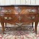 Commode sauteuse de style Louis XV en marqueterie