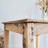 Antique farmhouse table in raw wood