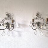 Pair of sconces in patinated metal and crystal tassels