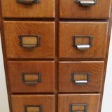 Antique oak apothecary cabinet with drawers