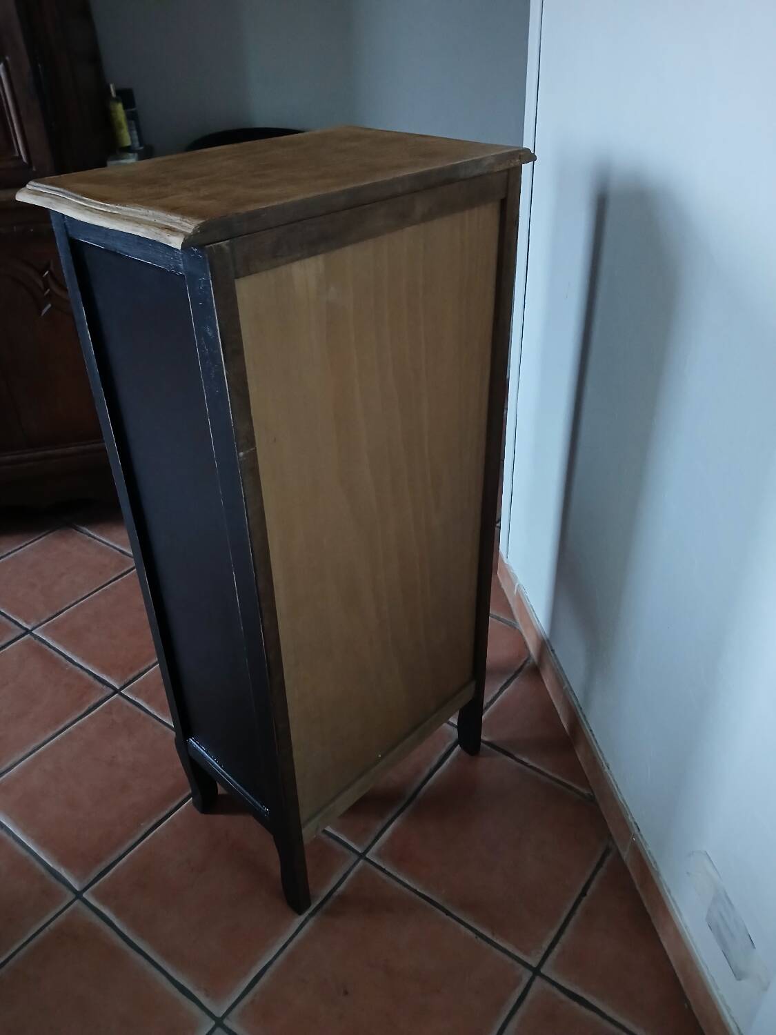 Black painted wooden chest of drawers