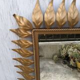 Vintage gold metal mirror with leaves from the 1950s.