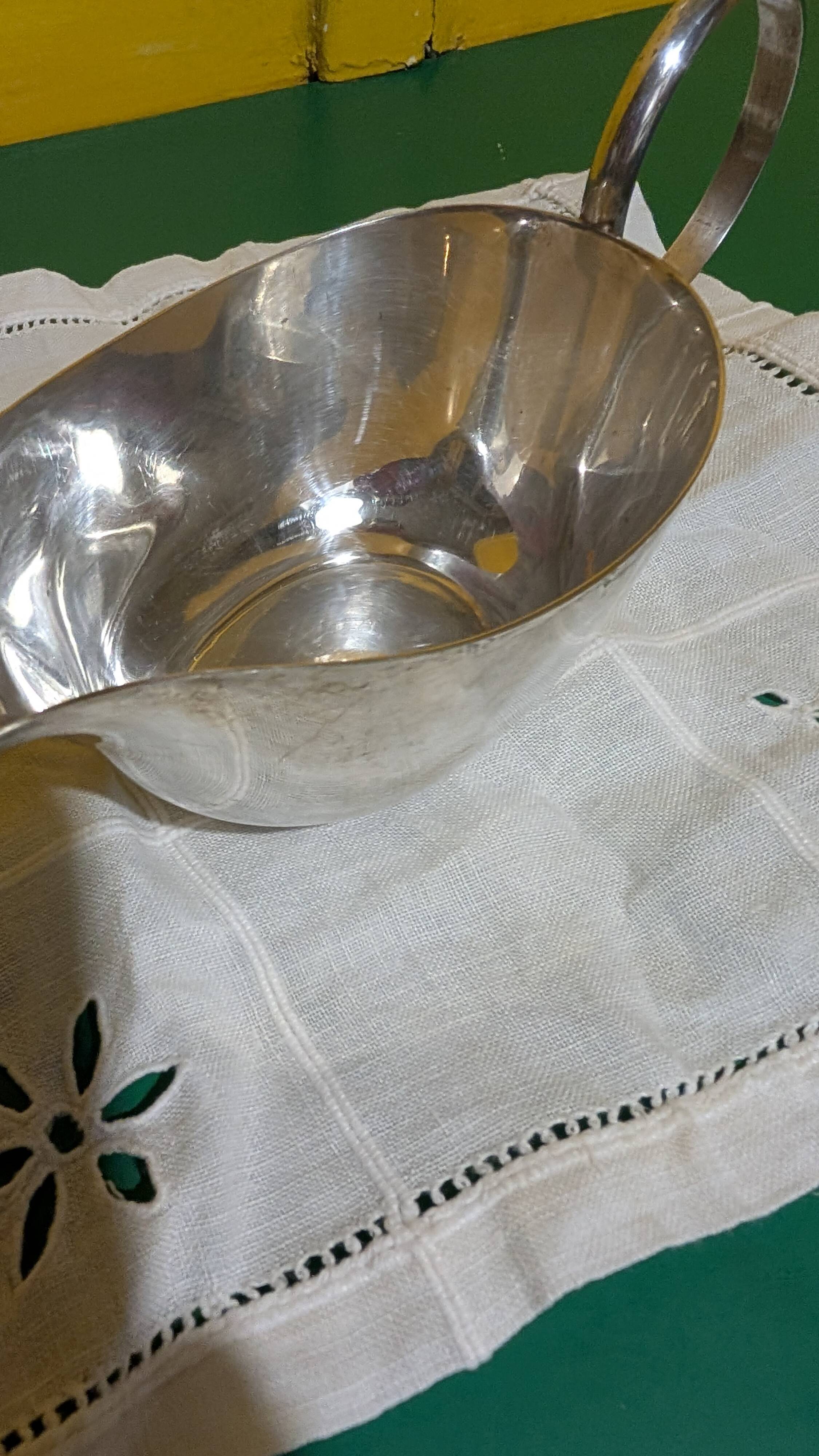 Silver-plated metal gravy boat, made by Meurgey silversmiths in Paris