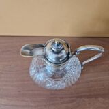 Cut crystal carafe and silver-plated metal