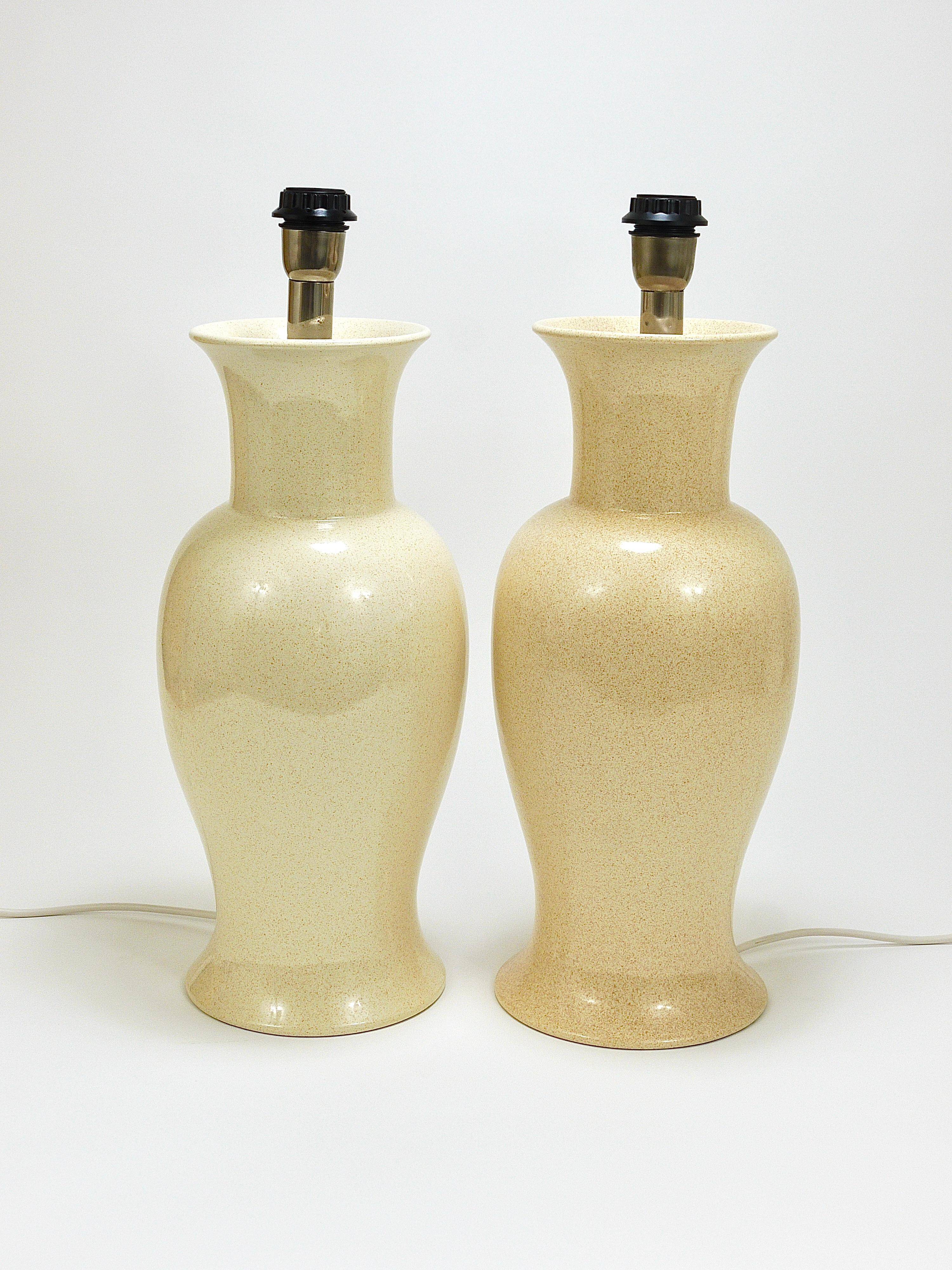 Pair of Tommaso Barbi Riviera palm tree table lamps from the 1970s with matching cushions.