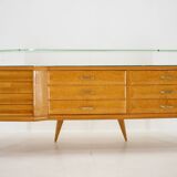 1960s italian sideboard/chest of drawers in high gloss finish with glass top and shelf