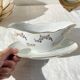 J&Ciem France 1950 white gilded porcelain sauce boat with floral pattern