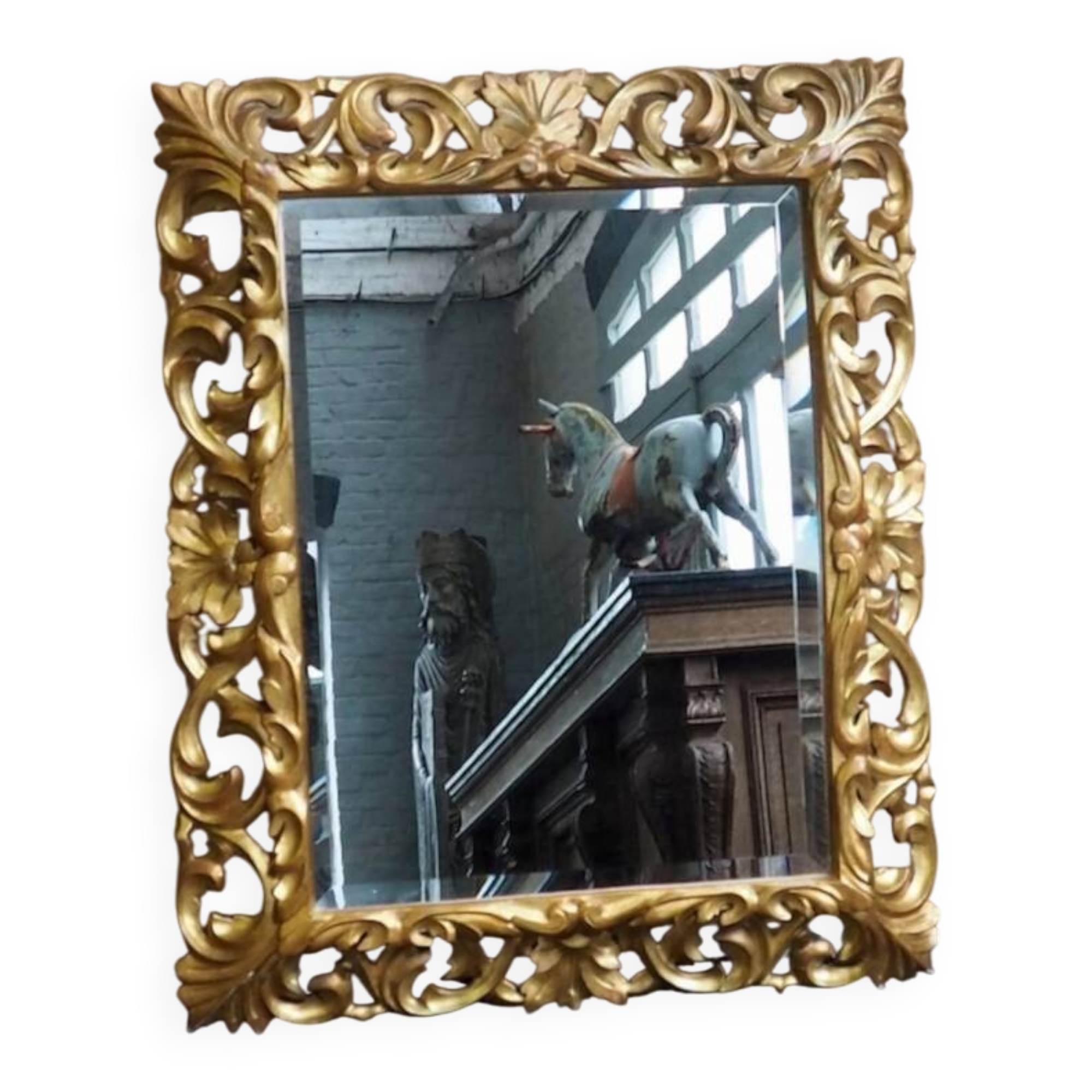 Superb mirror from the late 19th century, carved wood with gilded stucco.