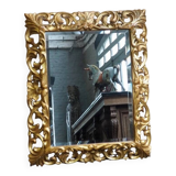 Superb mirror from the late 19th century, carved wood with gilded stucco.