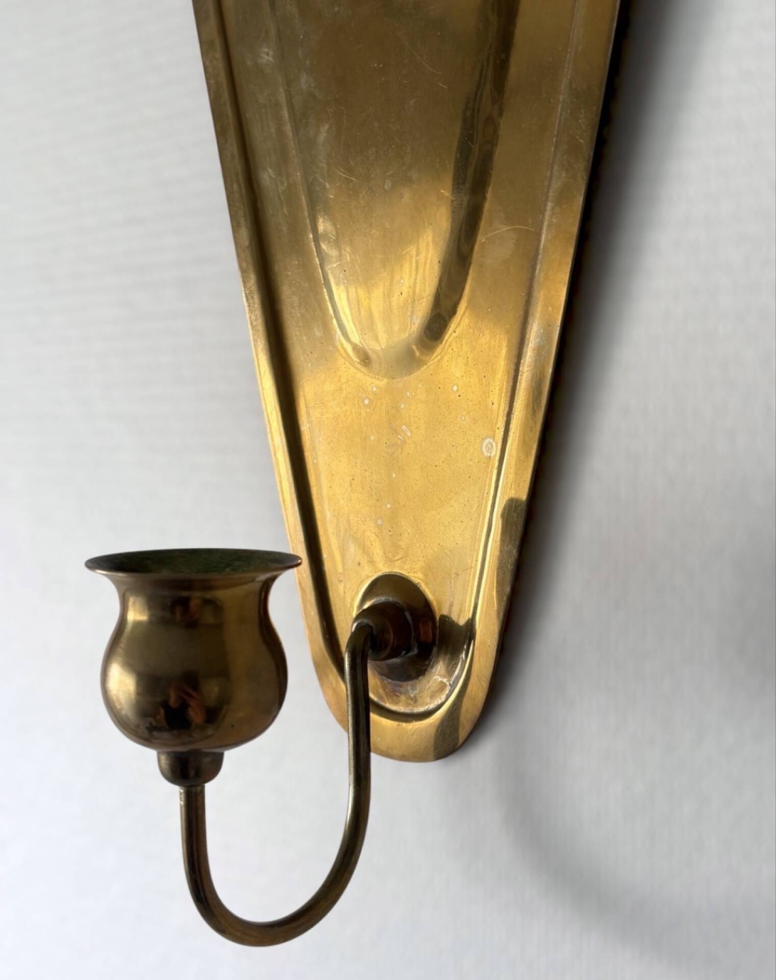 Scandinavian wall candle holders in brass