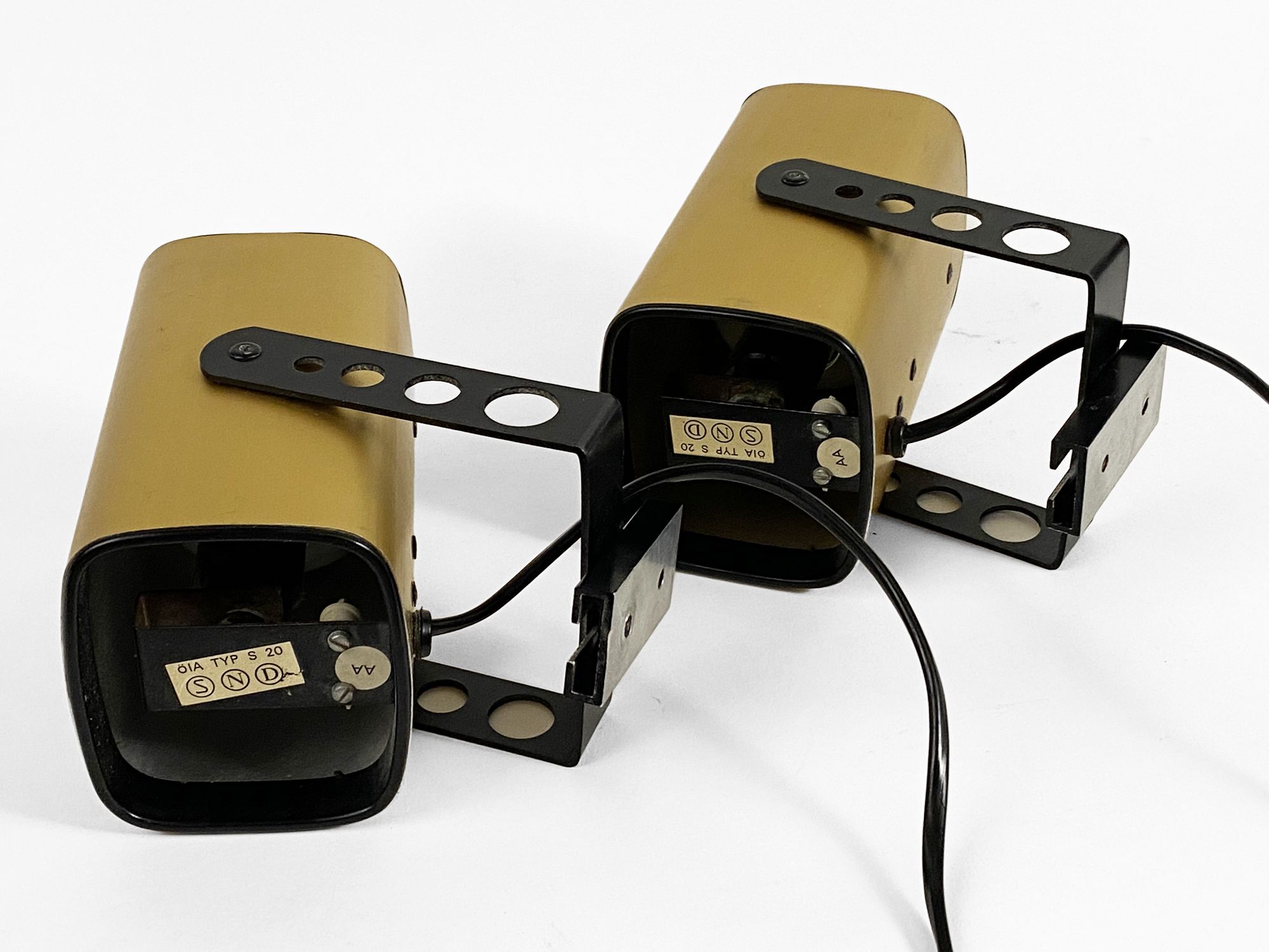 Pair of matte gold bedside wall lamps by Öia. Sweden 1970s