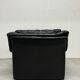 Vintage black leather lounge chair — low postmodern club chair from the space age.
