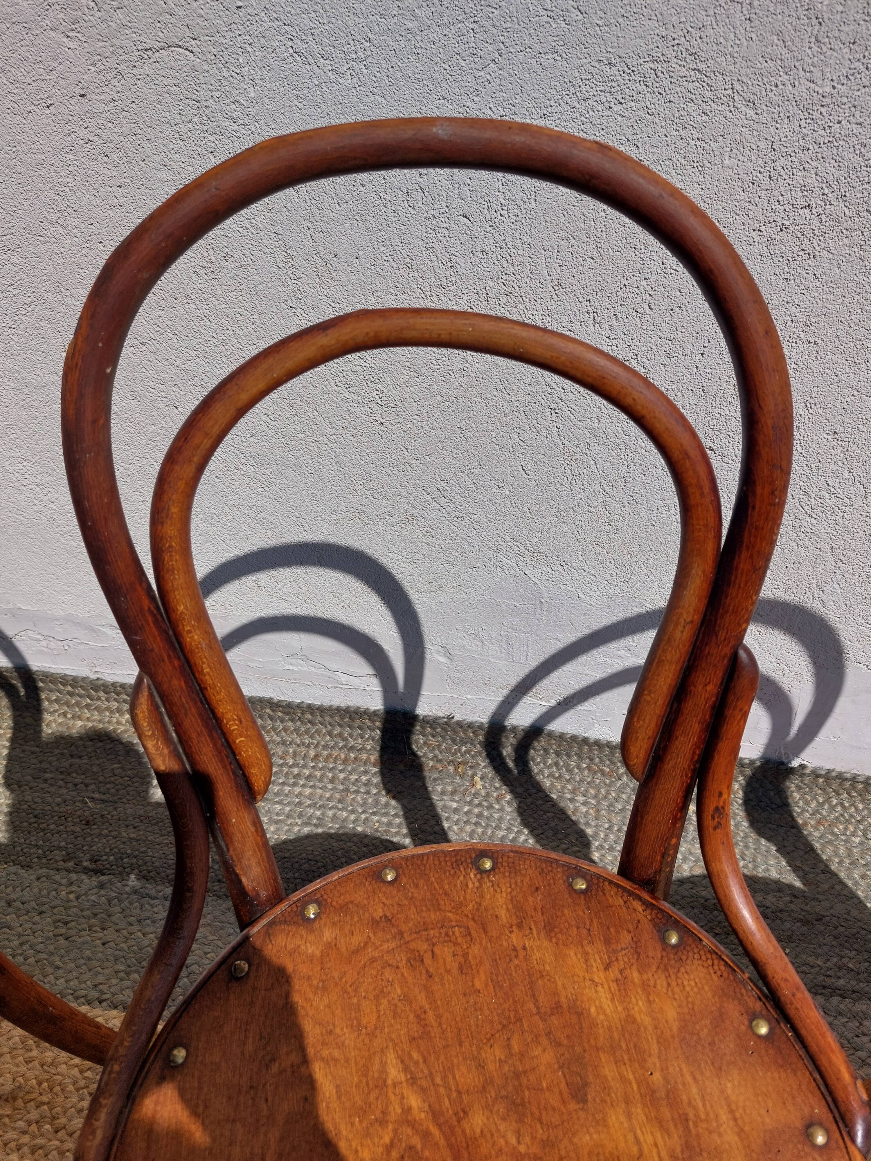 4 curved wooden bistro chairs