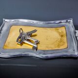 Brutalist pocket emptier by Leopold, bronze and aluminum 1970, Spain