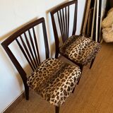 Pair of vintage wood and leopard chairs