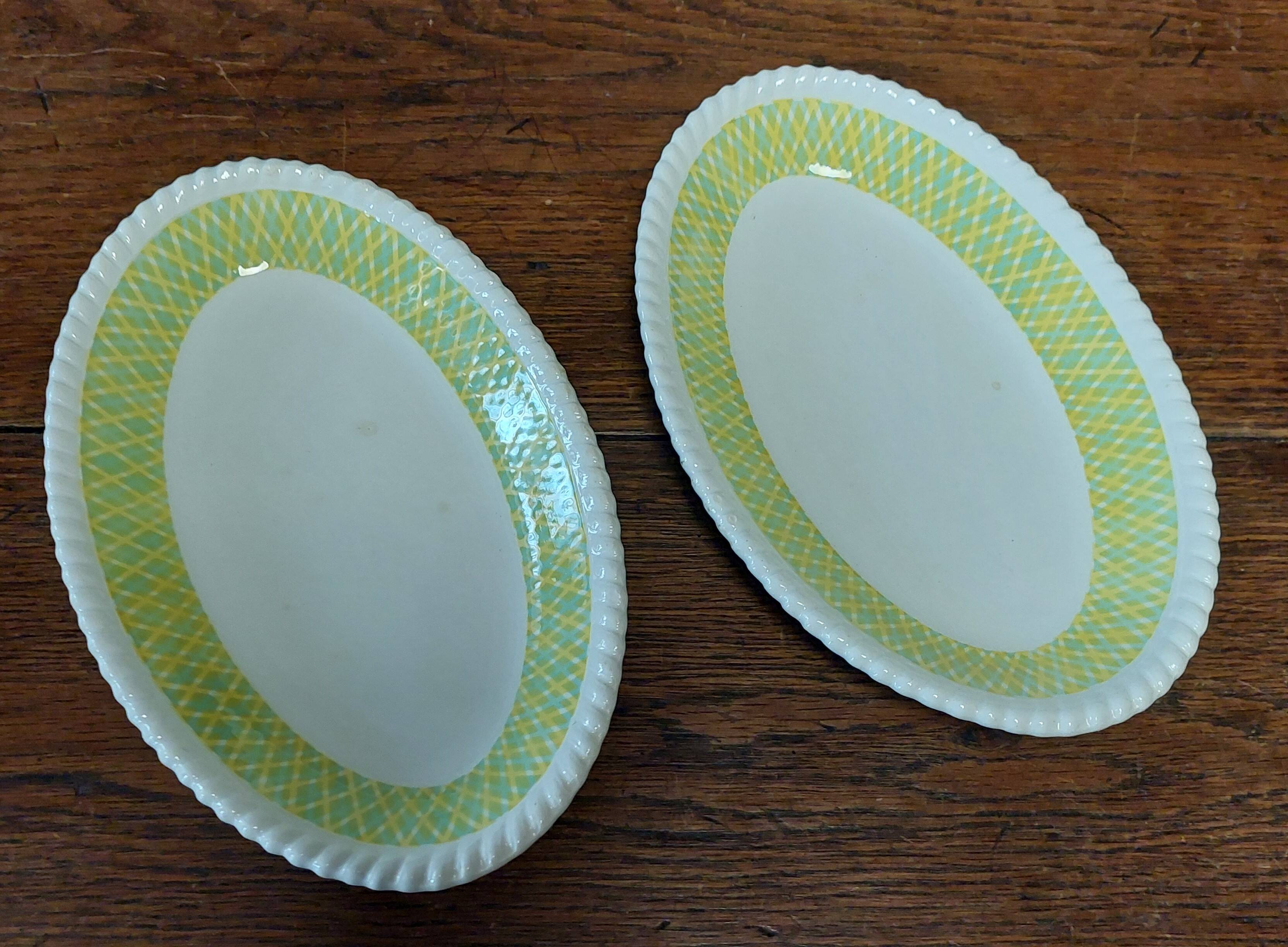 Pair of Badonviller iron earthenware dishes, Amina model