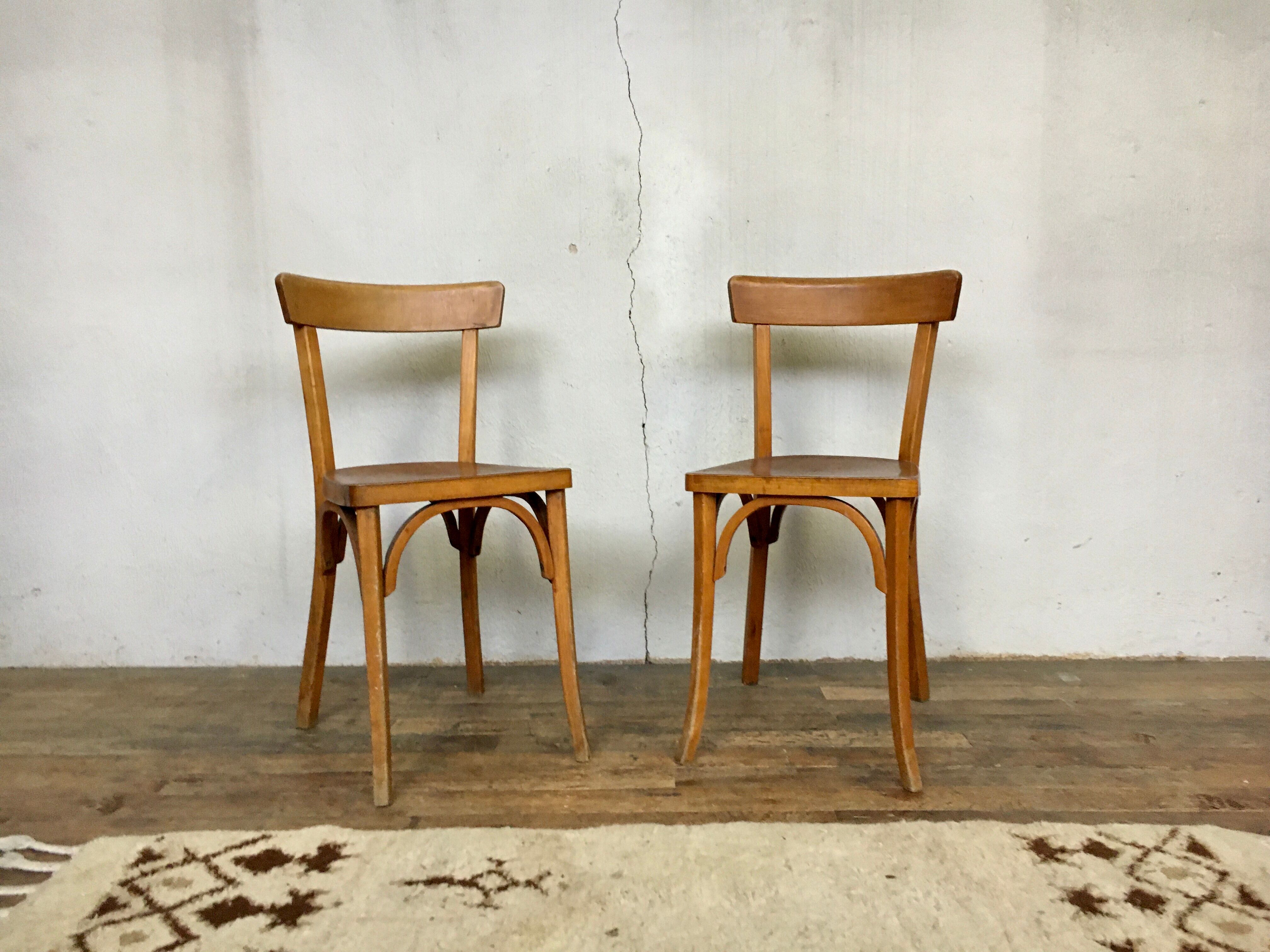 Pair of vintage clear beech baumann chair