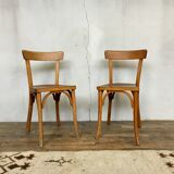 Pair of vintage clear beech baumann chair
