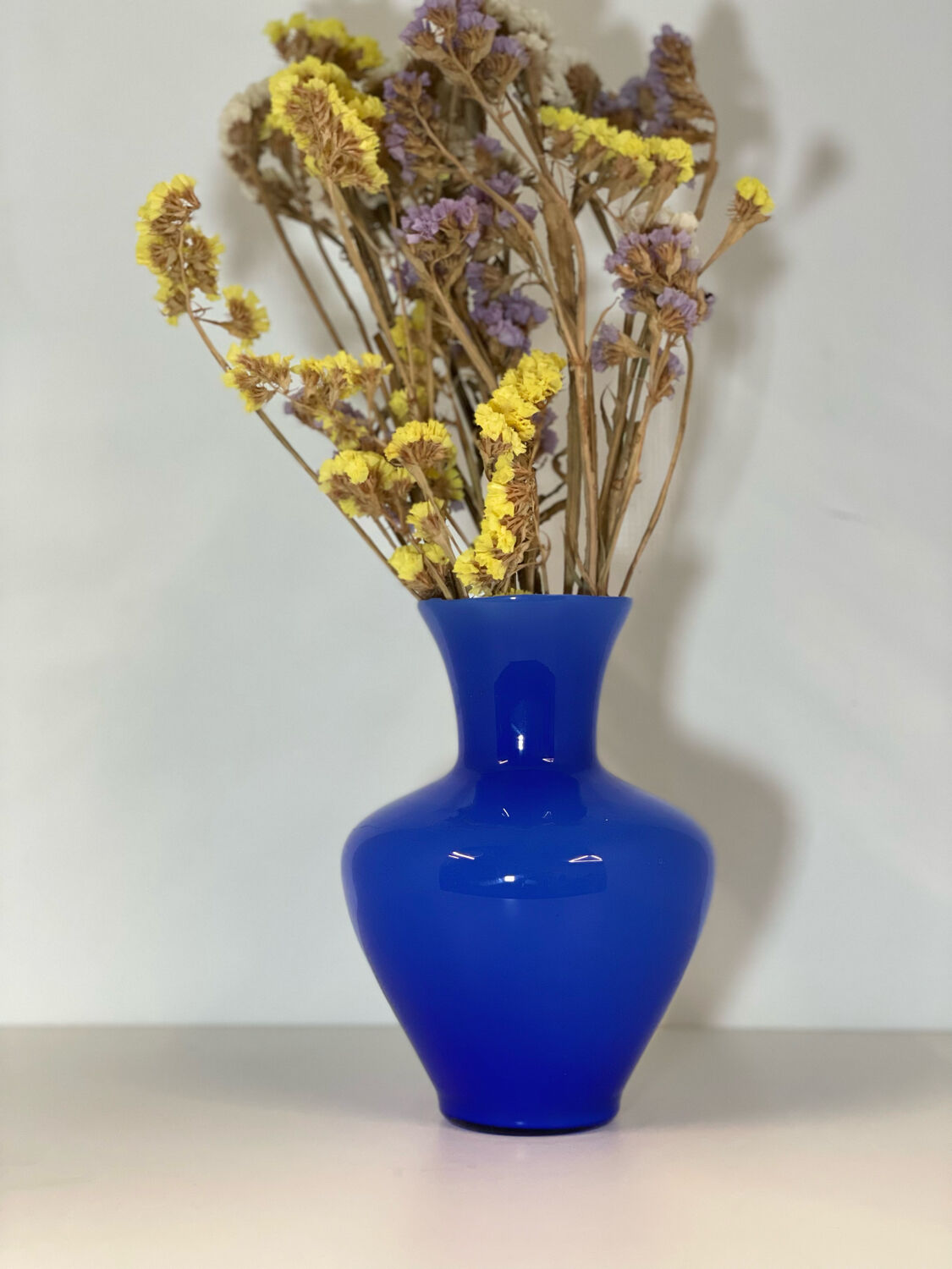 Electric blue opaline vase