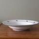Set of 5 deep porcelain plates in cherry table colours.