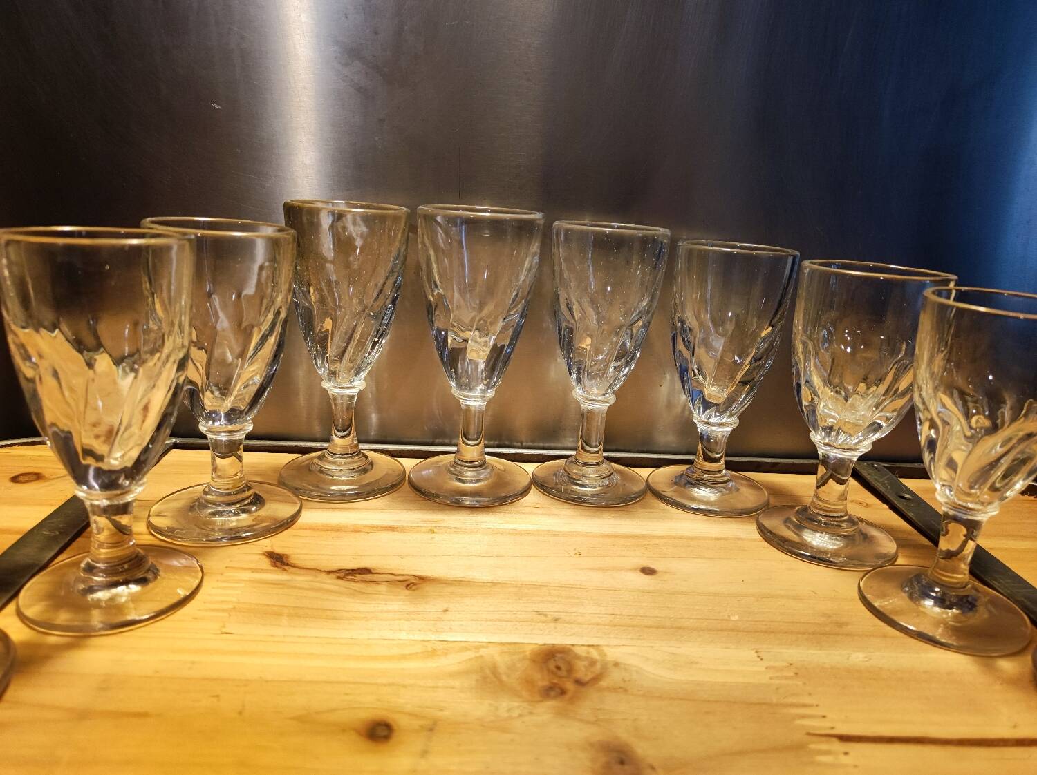 12 small twisted bistro glasses, 19th century