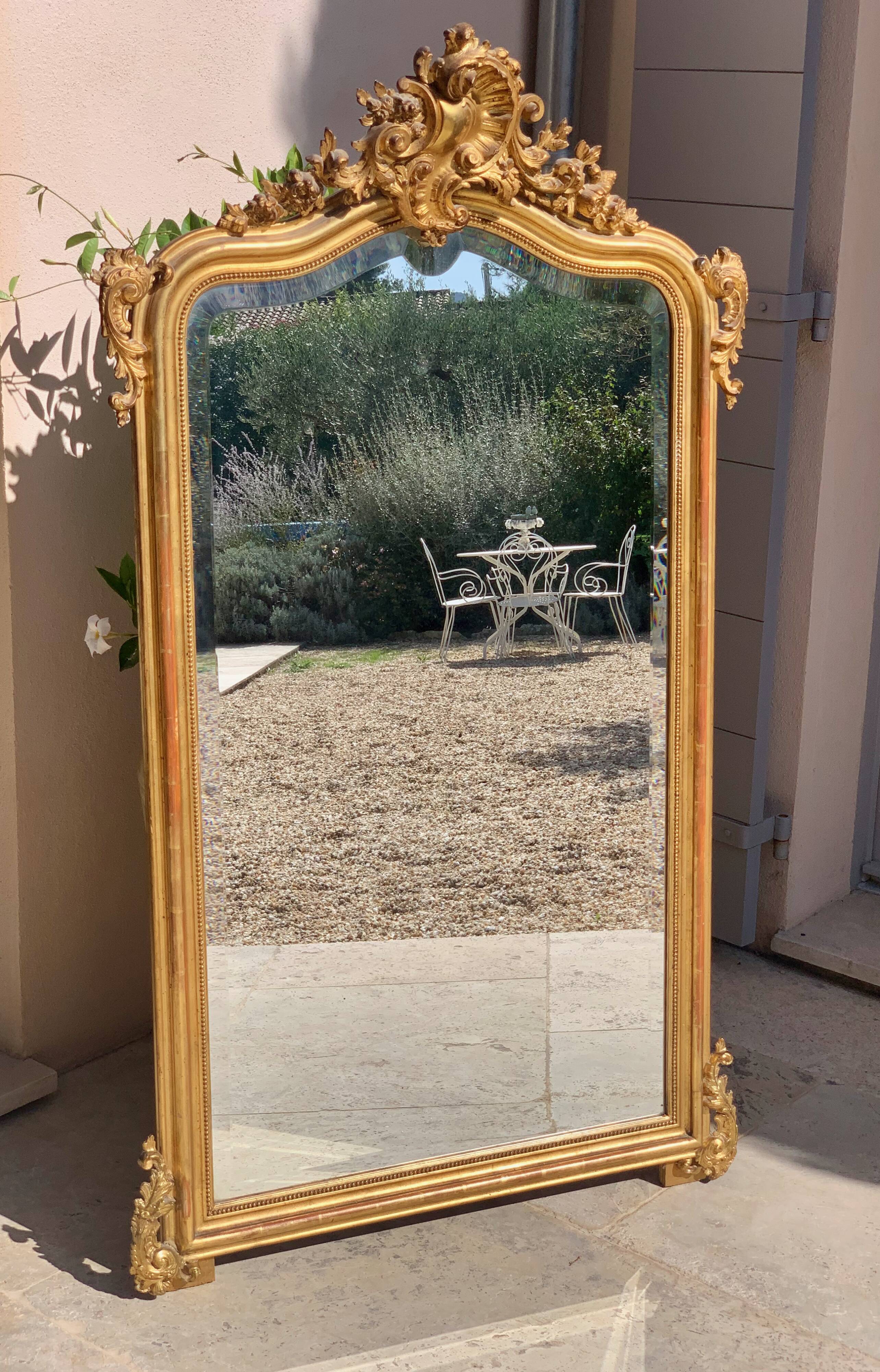 Napoleon iii beveled mirror in 19th century rocaille style, large model, in gilded wood