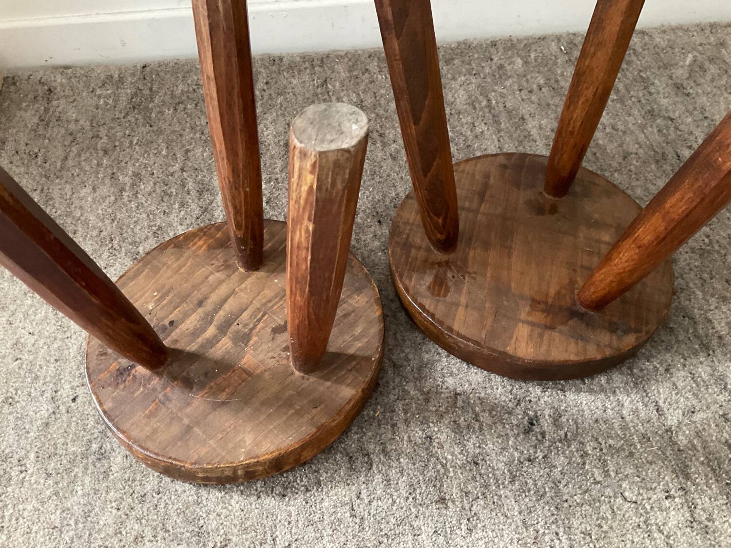 Pair of wooden tripod foot stools
