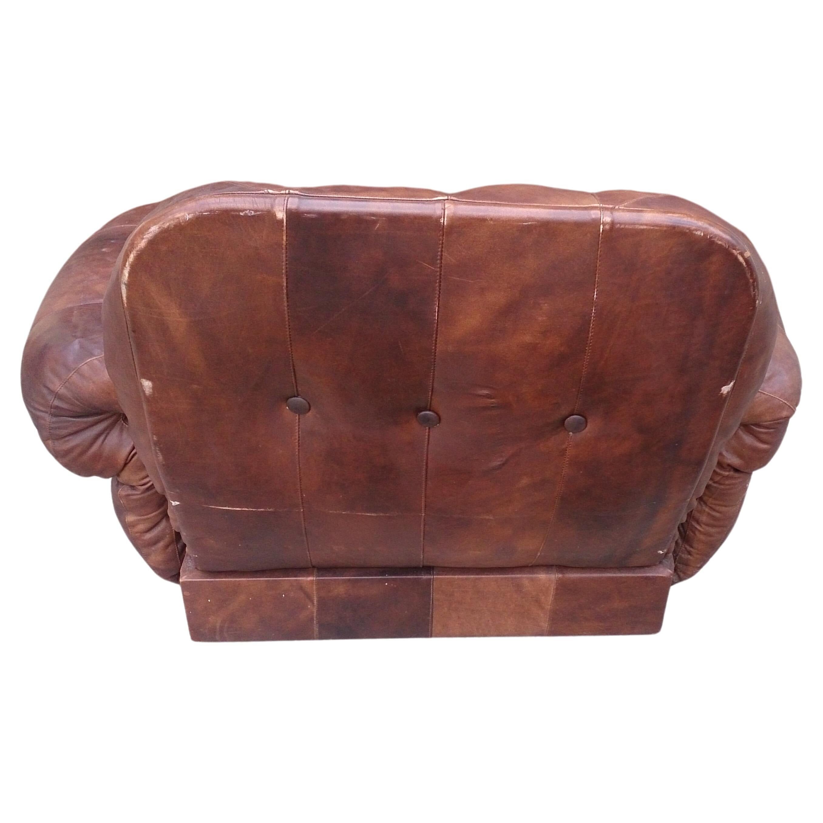 Vintage brown leather lounge chair