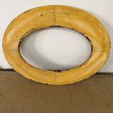 Large format golden oval frame