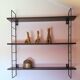 String style wall shelf