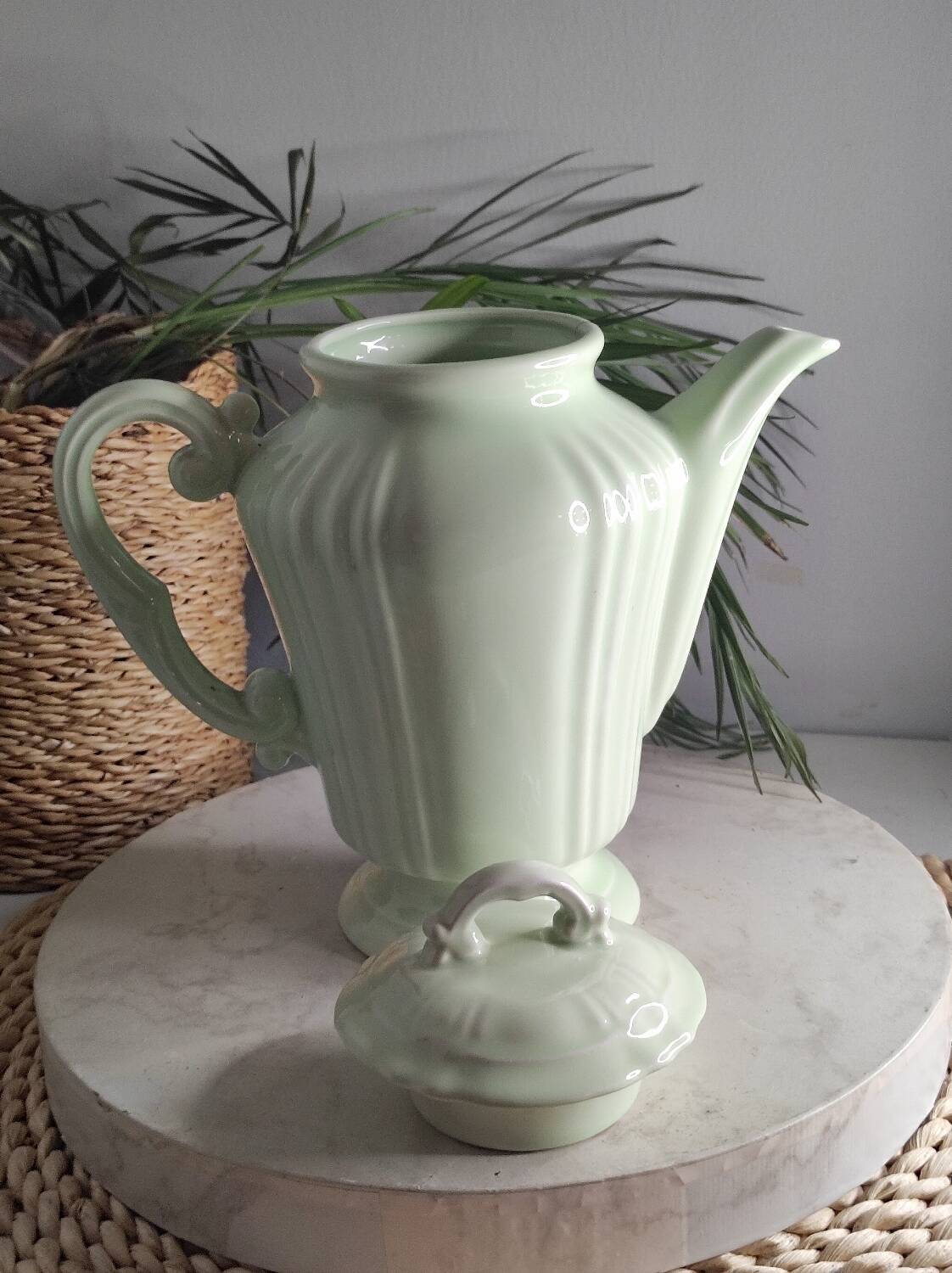 Green ceramic teapot
