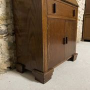 Oak display secretary cabinet with drop-down front, two sections.