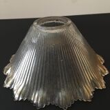 Transparent, slightly amber glass tulip. Vertical streaks.
