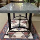 Table en marbre et piétement fonte