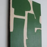 Abstract green art on a beige background.