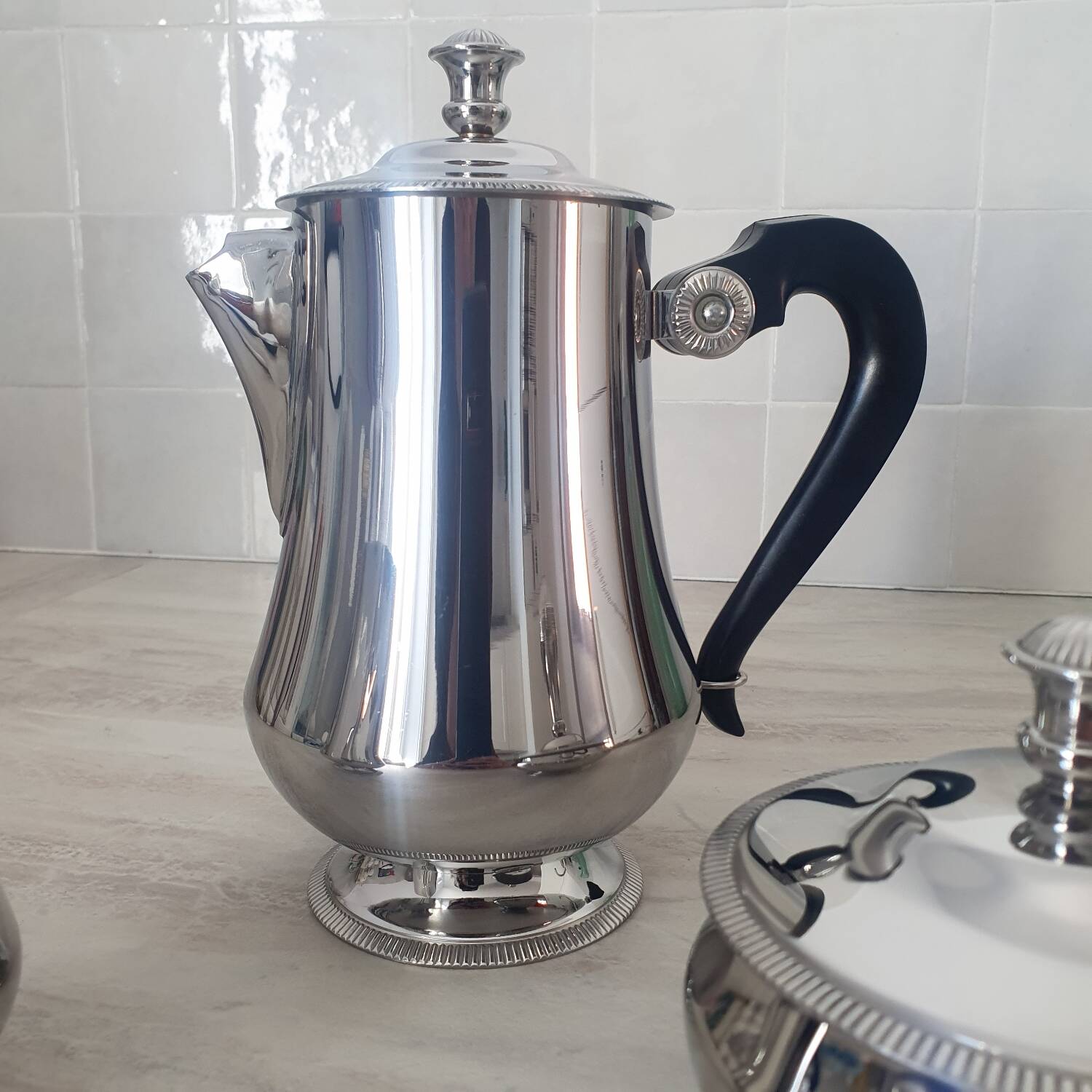 Rémy Letang / Teapot, milk jug and sugar bowl in 18/10 stainless steel and Bakelite