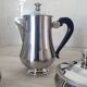Rémy Letang / Teapot, milk jug and sugar bowl in 18/10 stainless steel and Bakelite