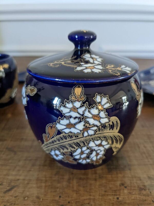 Ensemble plateau et ses pots en faïence