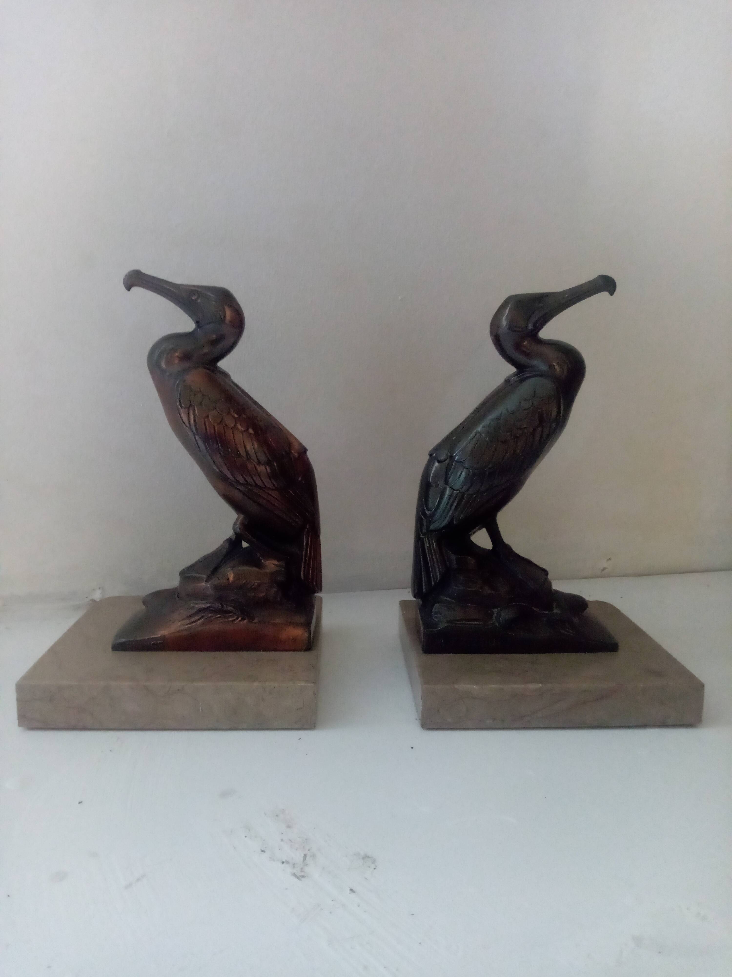 Pelican bookend signed Frecourt
