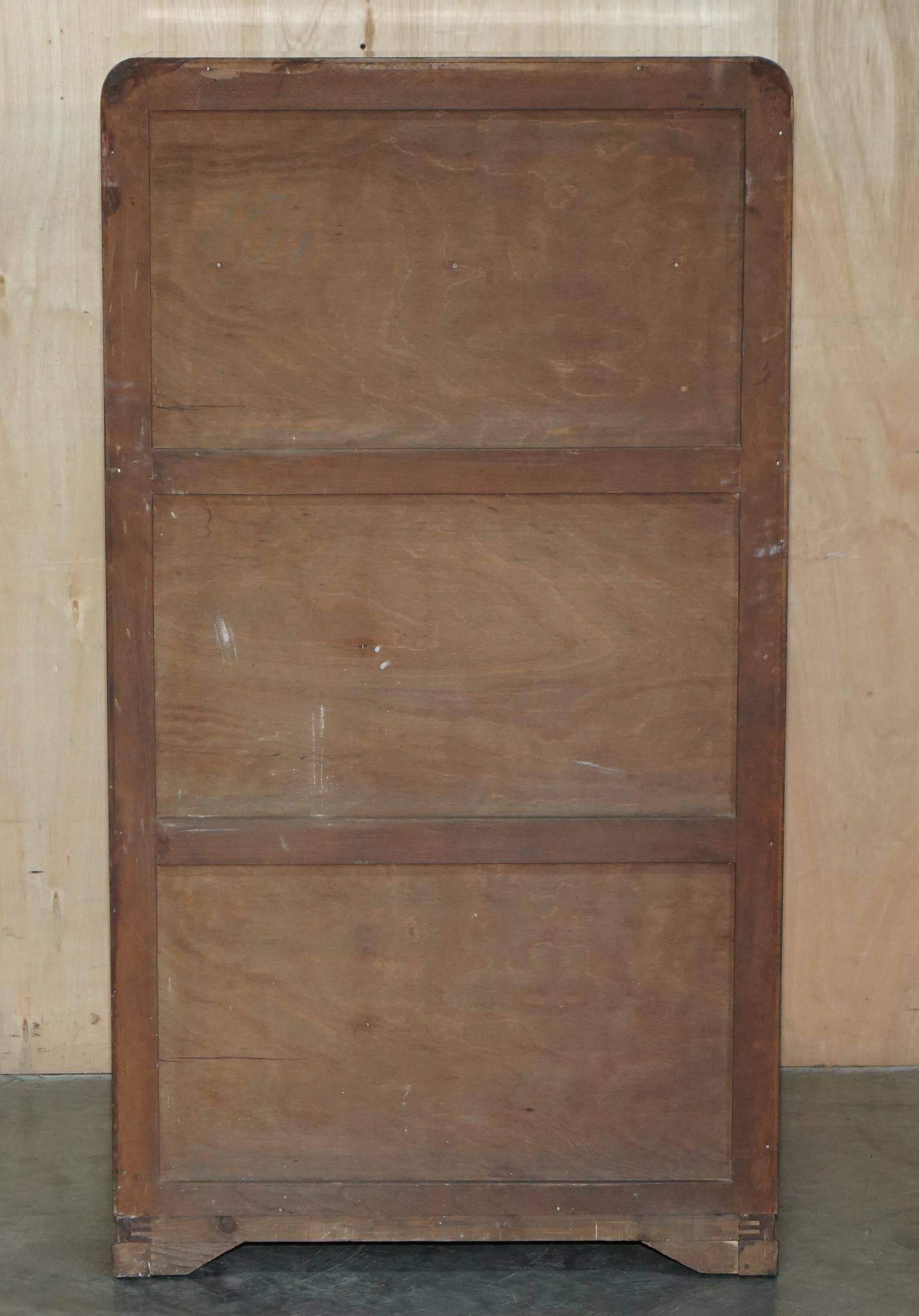 Small Art Deco wardrobe in satin walnut, circa 1930.