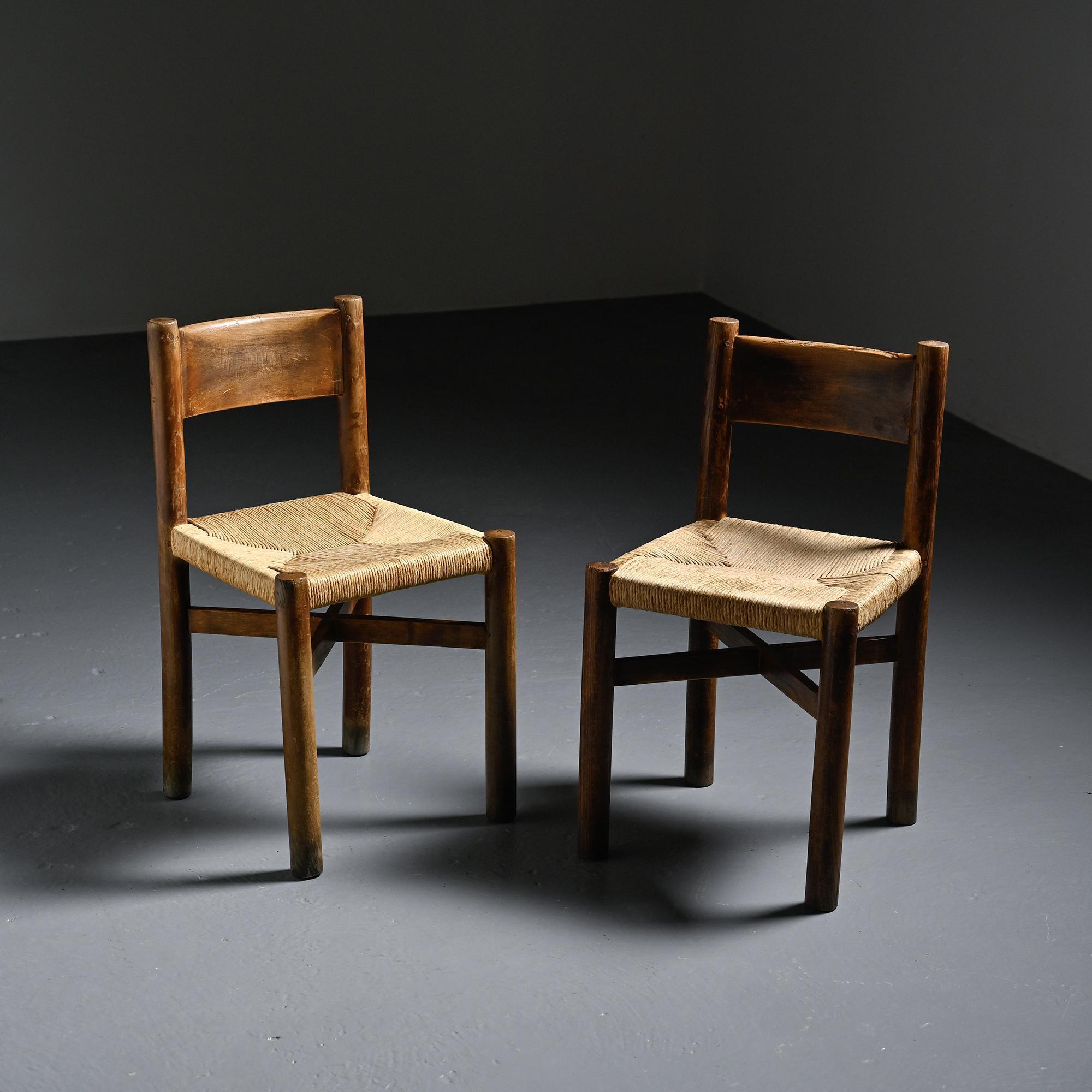 Pair of Méribel chairs by Charlotte Perriand, vintage edition BCB, circa 1950.