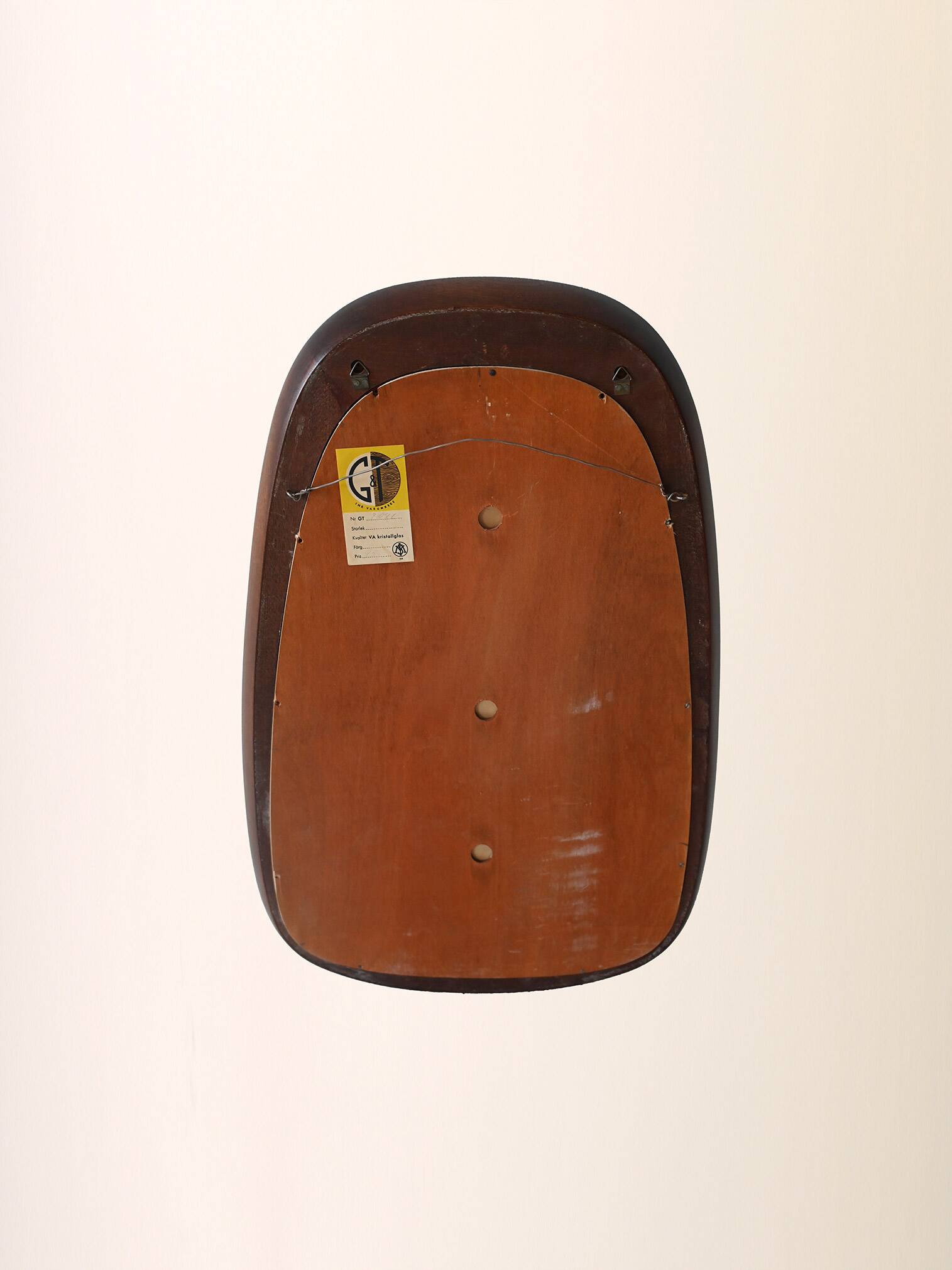 Scandinavian vintage mirror with curved mahogany frame