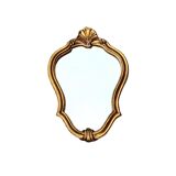 Old small wall mirror in golden resin